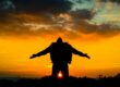 silhouette of man spreading its arm